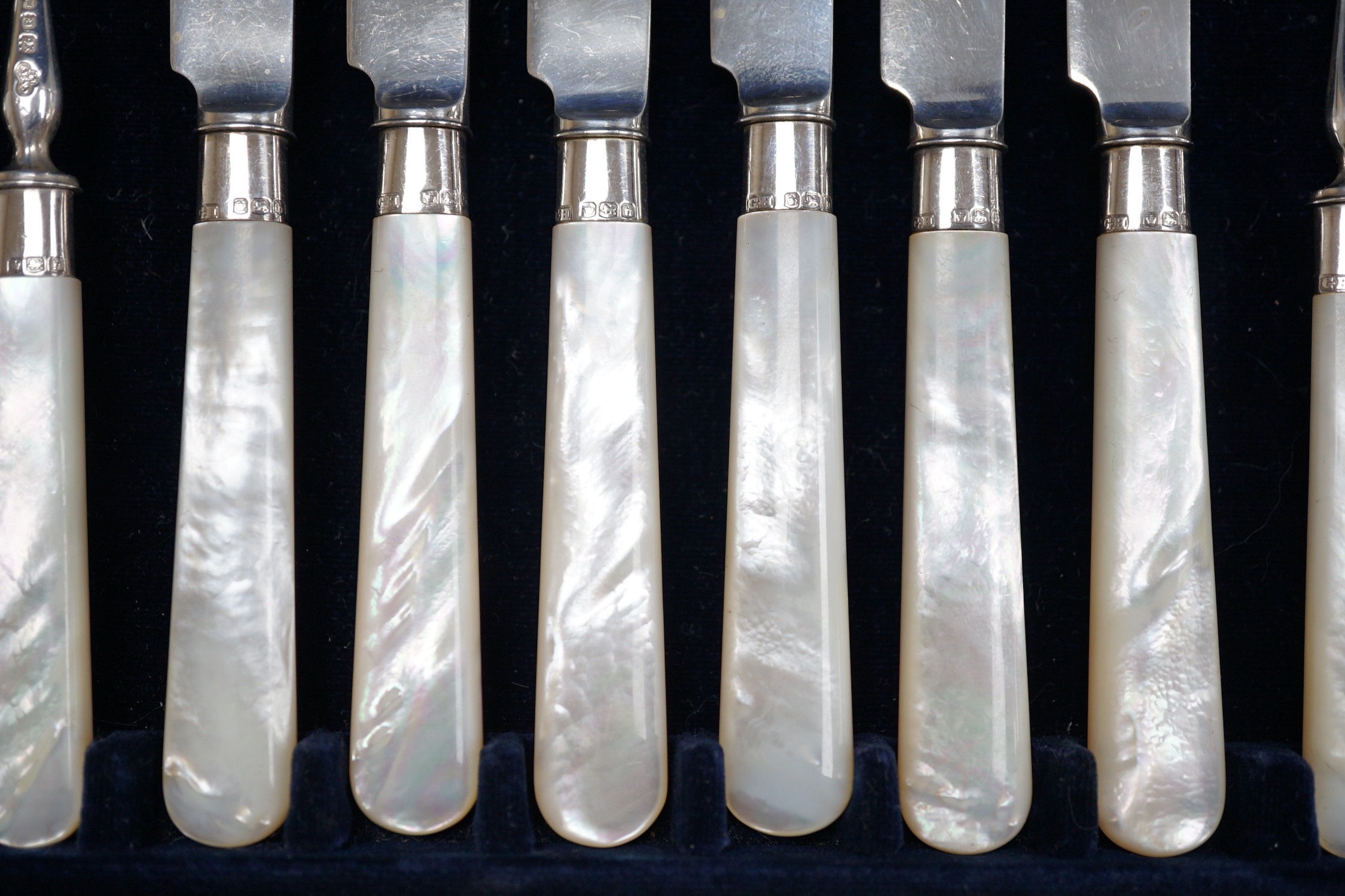 A cased set of six pairs of George V mother of pearl handled silver dessert eaters, Goldsmiths & Silversmiths Co Ltd. London, 1926.